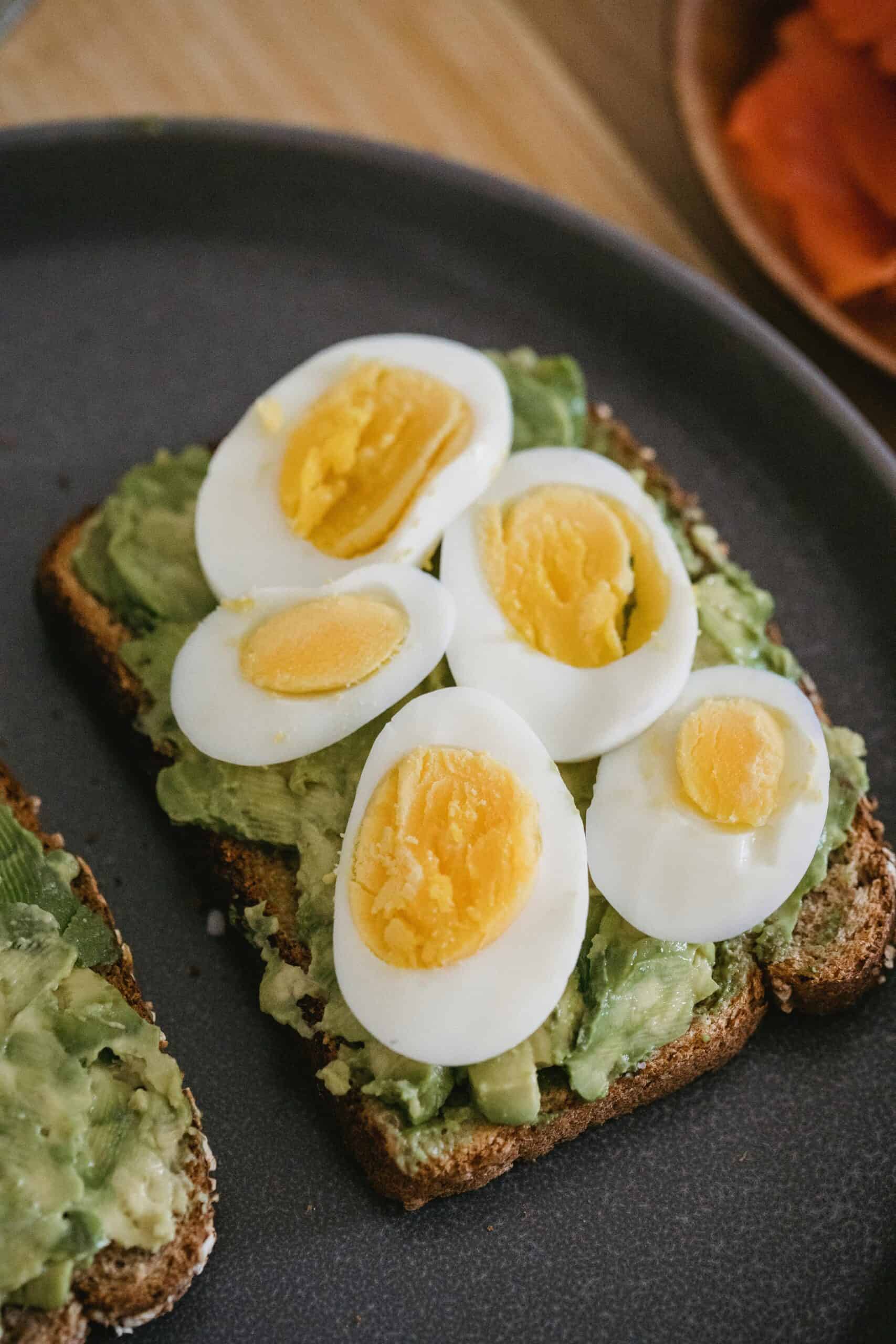 hard boiled eggs on avocado toast