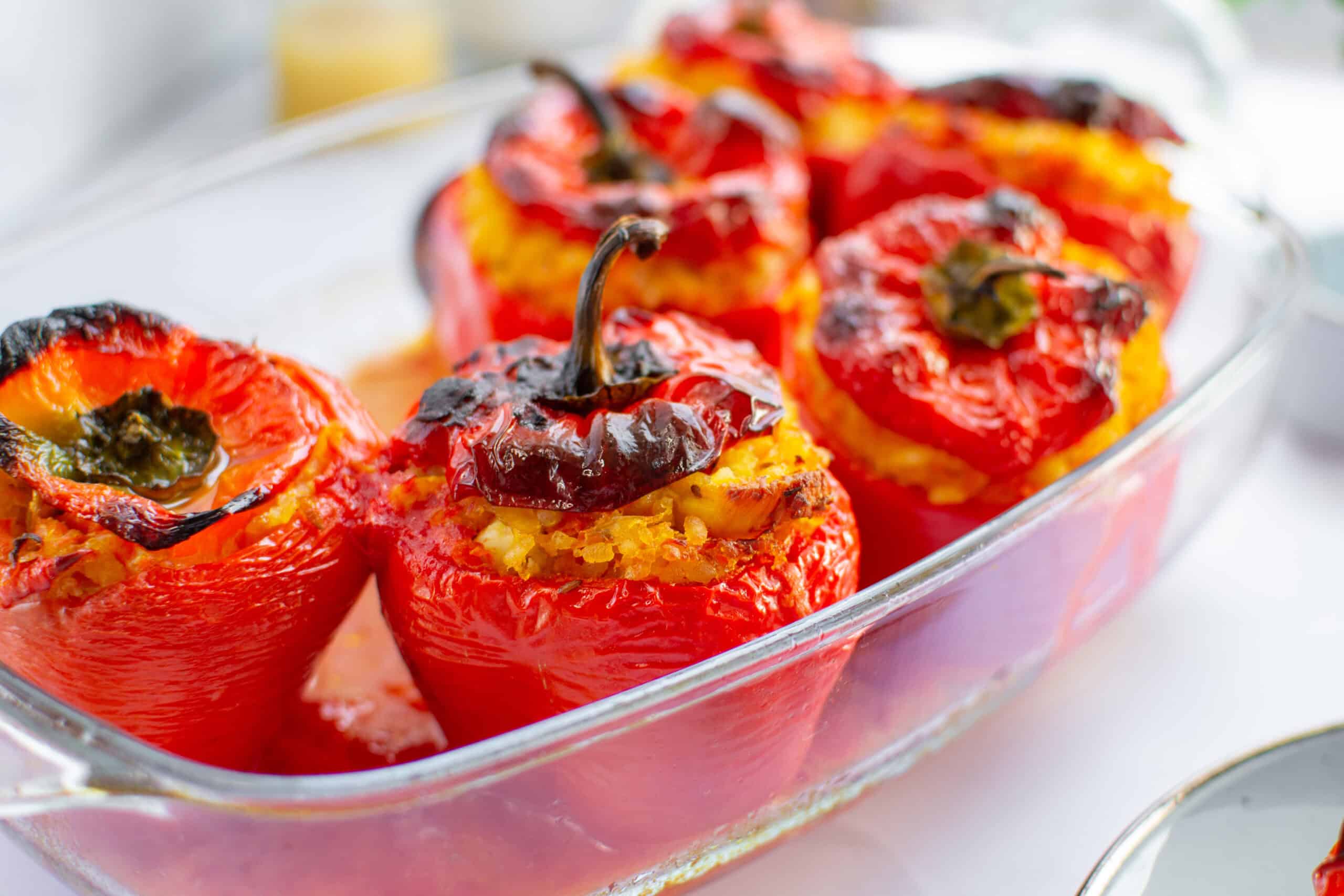 stuffed bell peppers in baking dish