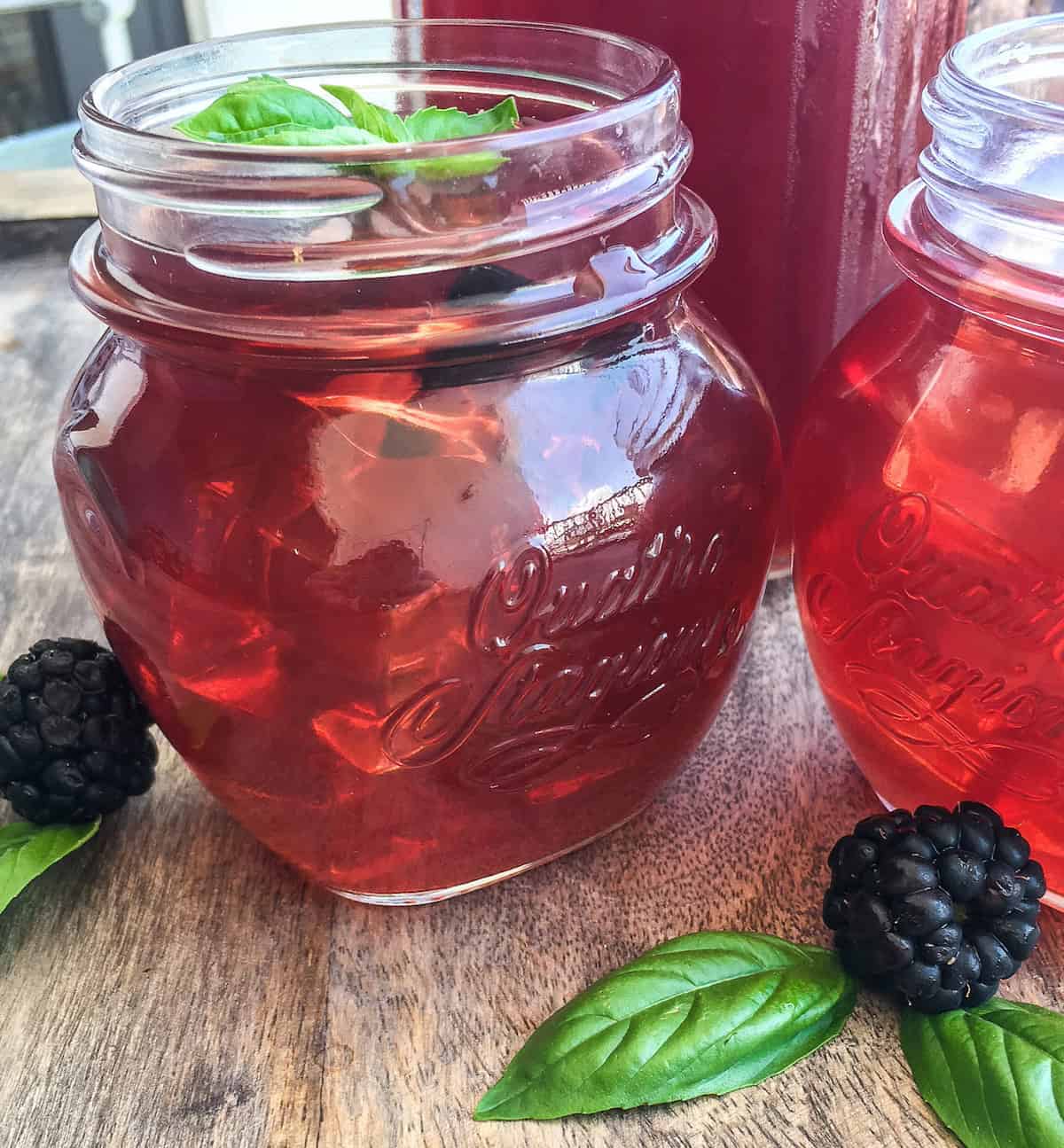 closeup of a glass of blackberry iced tea