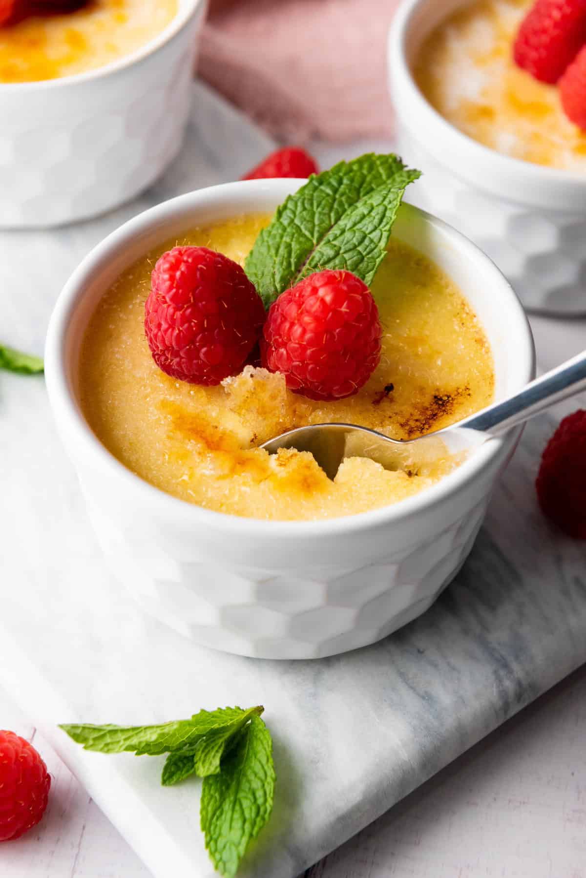 closeup of creme brulee with spoon