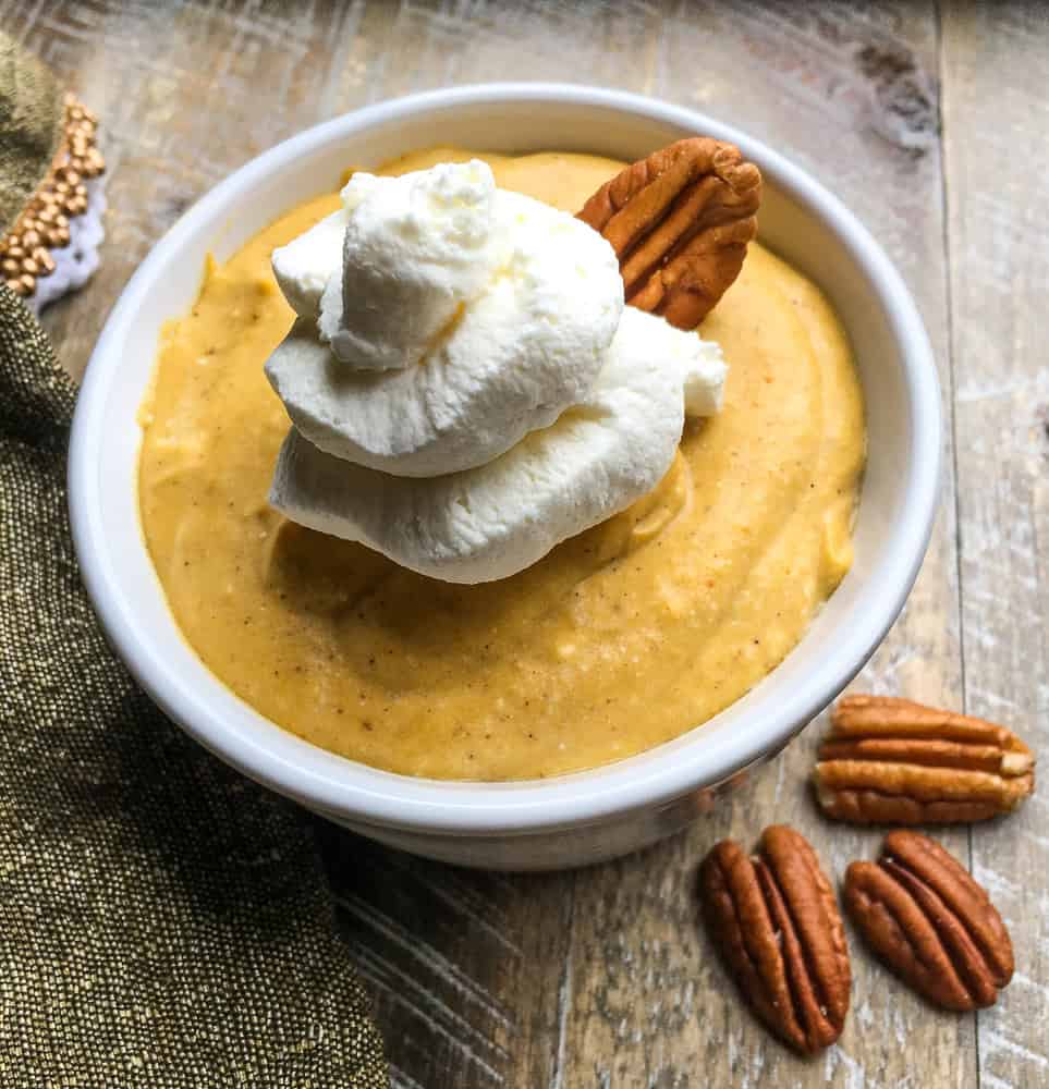 closeup of pumpkin mousse with walnuts