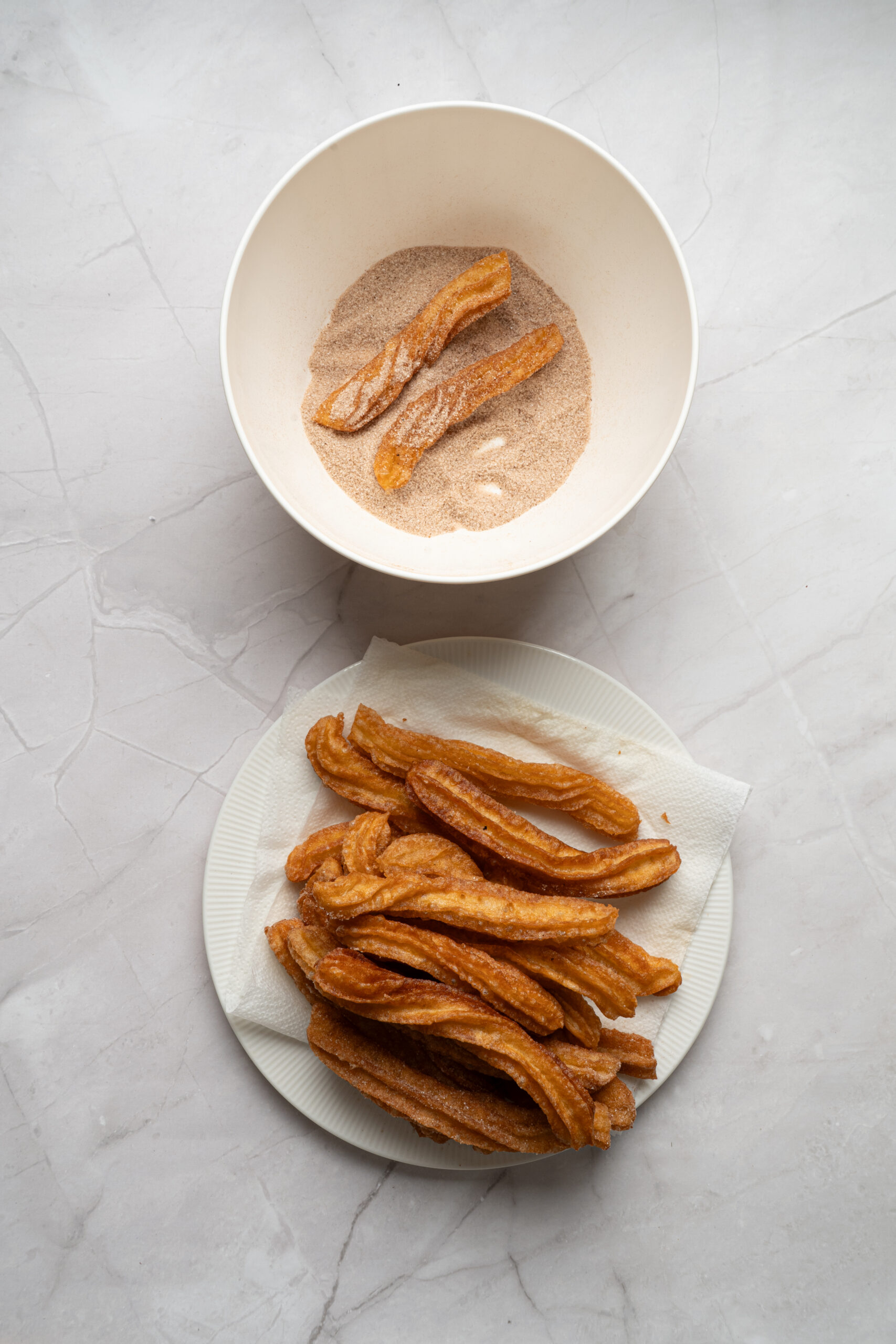 step 6 churros in coating bowl