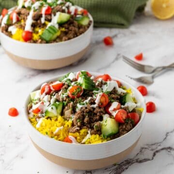 two halal cart beef rice bowls