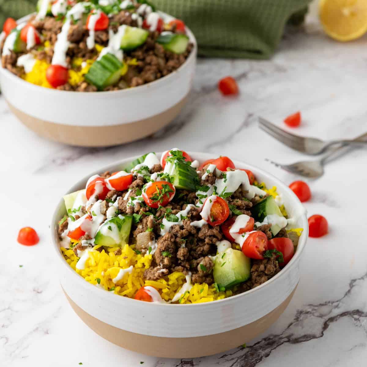 two halal cart beef rice bowls