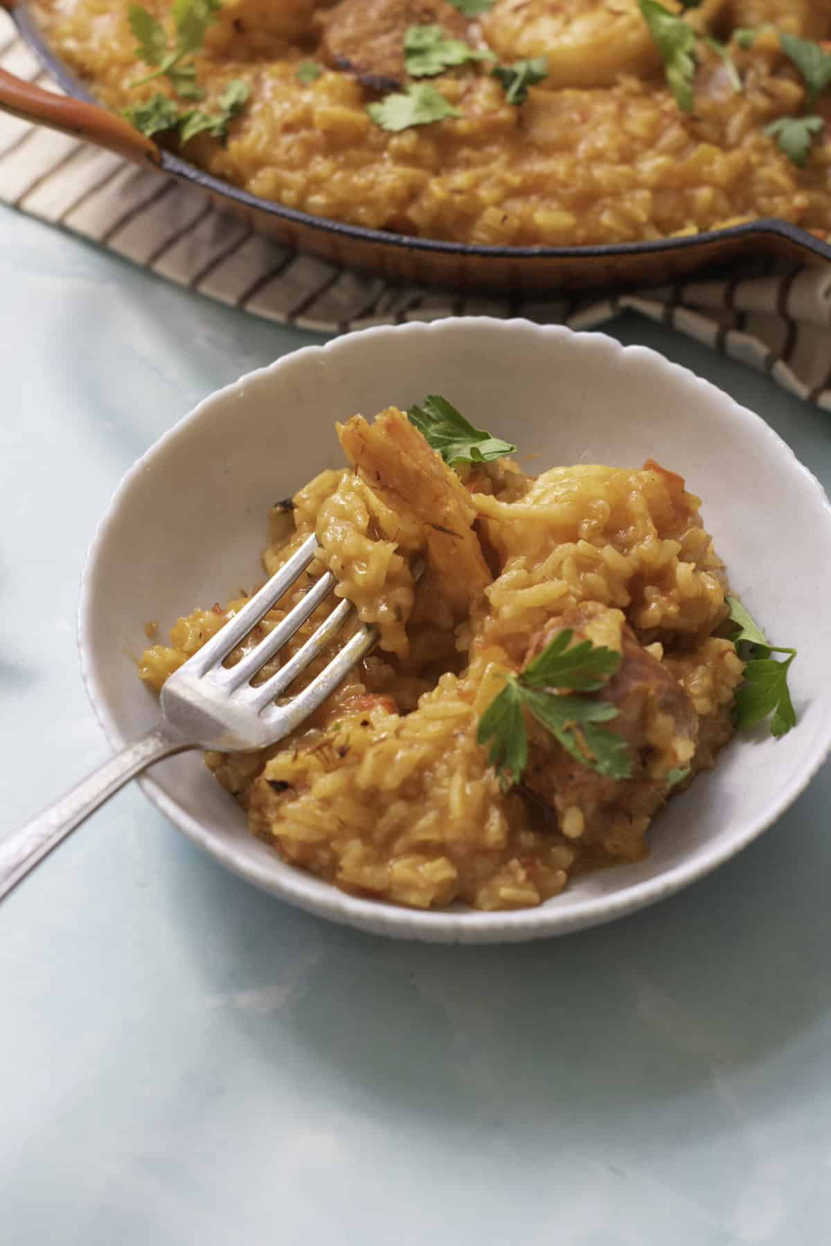 shrimp saffron paella with fork