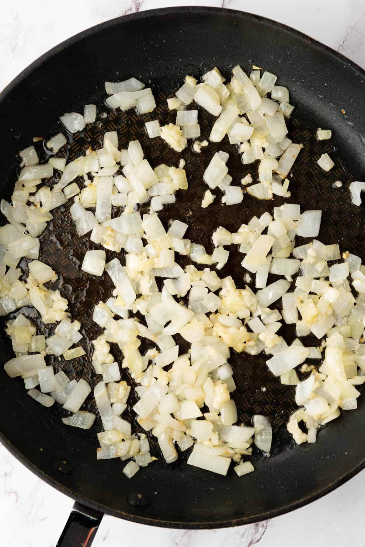 sauteed onions and garlic in skillet