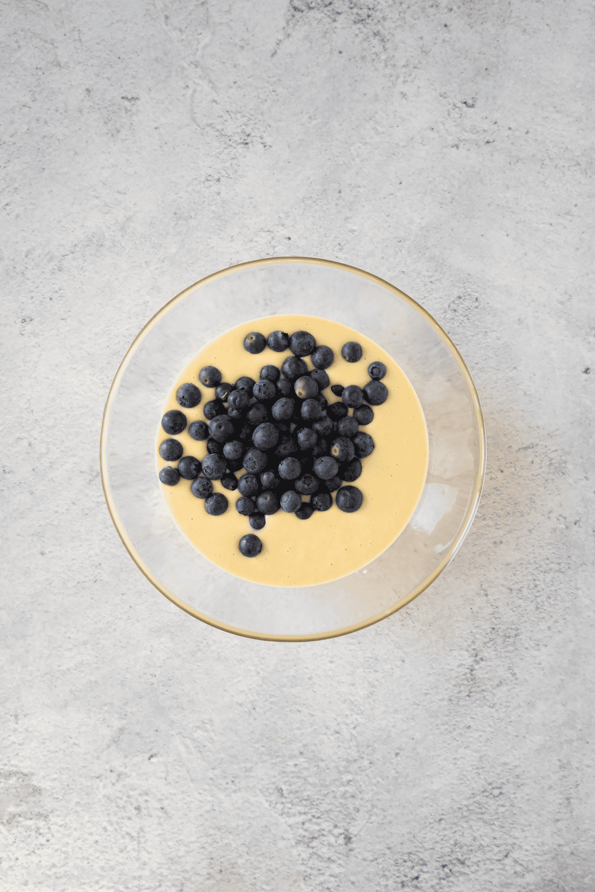 pancake batter with blueberries added